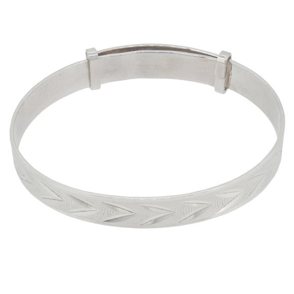 A modern, silver, child's expanding bangle