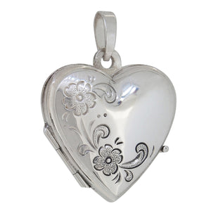 A modern, silver, heart shaped locket