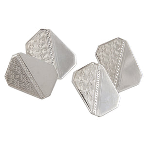 A pair of mid-20th century, silver, engine turned,  rectangular, cut corner, chain link cufflinks