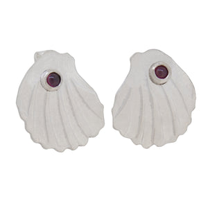 A pair of modern, silver, garnet set shell earrings