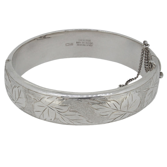 A mid-20th century, silver, half engraved, hinged bangle