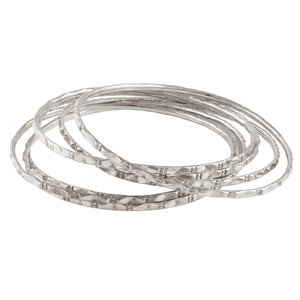 Seven modern, silver wire bangles