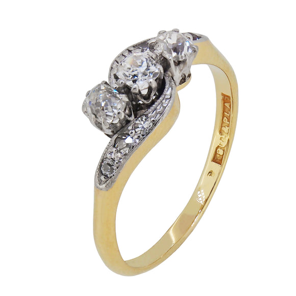 An early 20th century, 18ct yellow gold & platinum, diamond set, nine stone crossover ring