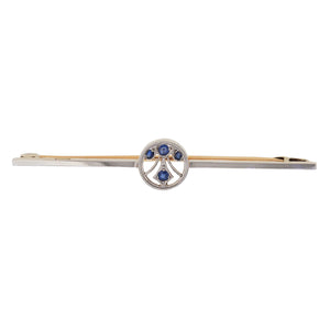 A modern, 15ct yellow gold & platinum top, sapphire set bar brooch