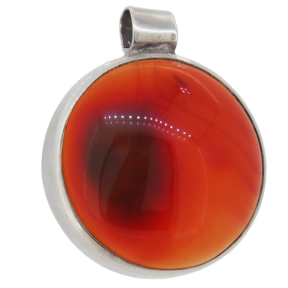 A modern, silver, brown agate set circular pendant