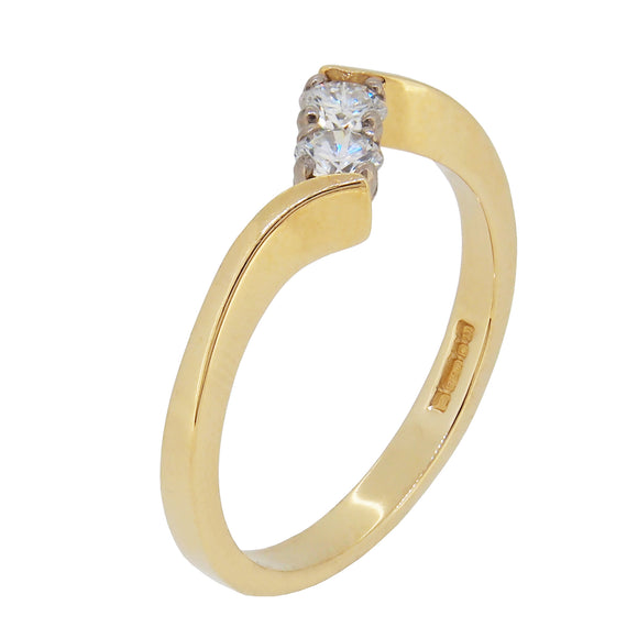 A modern, 18ct yellow gold, diamond set, two stone crossover ring