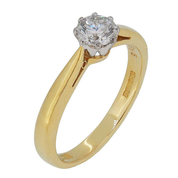 A modern, 18ct yellow gold, diamond set, single stone, solitaire ring