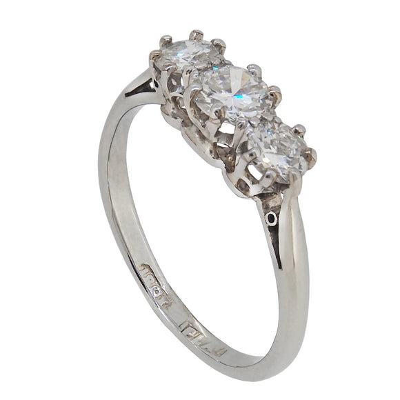 An early 20th century, 18ct white gold with platinum, setting, diamond set, three stone ring.