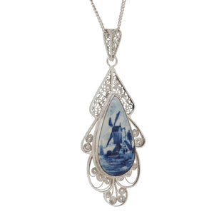 A mid-20th century, silver, filigree Delft set pendant & chain, featuring an image of a windmill.