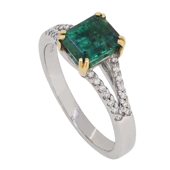 A modern, 18ct white gold, emerald & diamond set, twenty nine stone ring