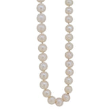 A modern, single row of cultured freshwater pearls on a silver trigger fastener