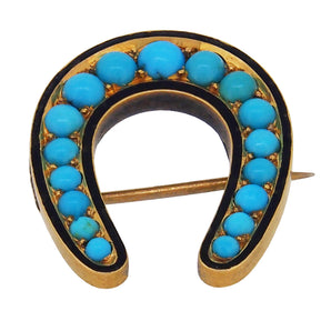 A Victorian, yellow gold, turquoise & black enamel set horseshoe brooch.