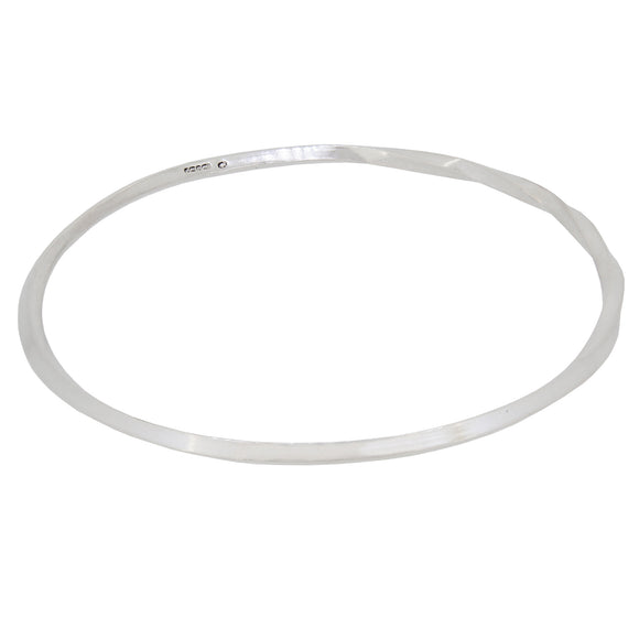 A modern, silver 'V' wire bangle
