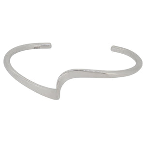 A modern, silver, solid, open twist bangle