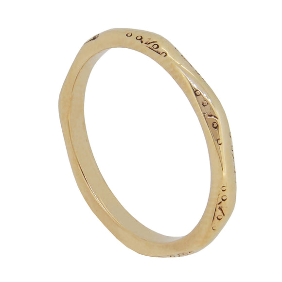 A mid-20th century, 9ct yellow gold, faceted wedding ring
