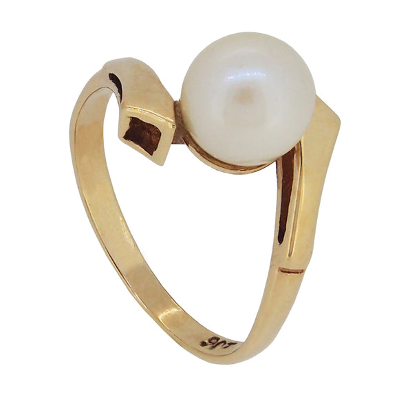 A modern, 9ct yellow gold, pearl set, single stone crossover ring