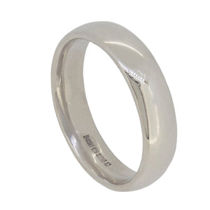 A modern, 9ct white gold, court wedding ring