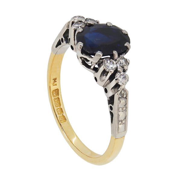 A mid 20th century, 18ct yellow gold, sapphire & diamond set seven stone ring