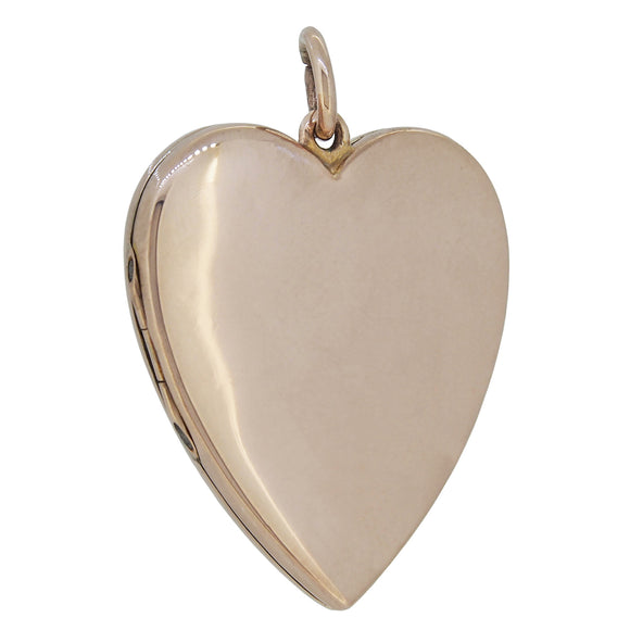 An Edwardian, 9ct rose gold, heart shaped locket