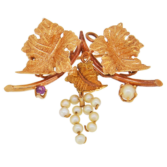 A modern, 14ct yellow gold, pearl & pink tourmaline set vine brooch