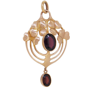 An Edwardian, 9ct yellow gold, garnet set, two stone pendant