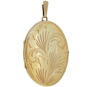A modern, 9ct yellow gold, engraved oval locket