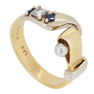 A modern, 14ct yellow & white gold, sapphire & princess cut diamond set, three stone, abstract hook ring
