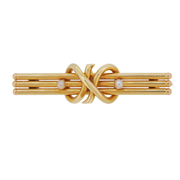 An early 20th century, 15ct yellow gold, pearl set, two stone, three bar brooch