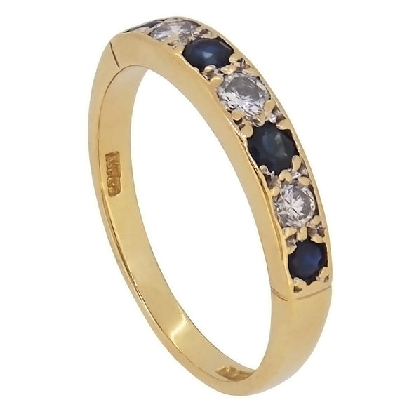 A modern, 18ct yellow gold, sapphire & diamond set, seven stone ring