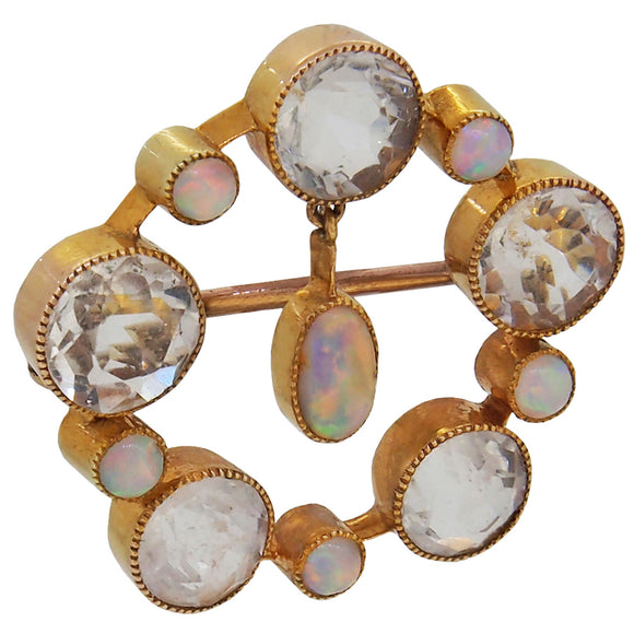 An Edwardian, yellow gold, aquamarine & opal set circular brooch