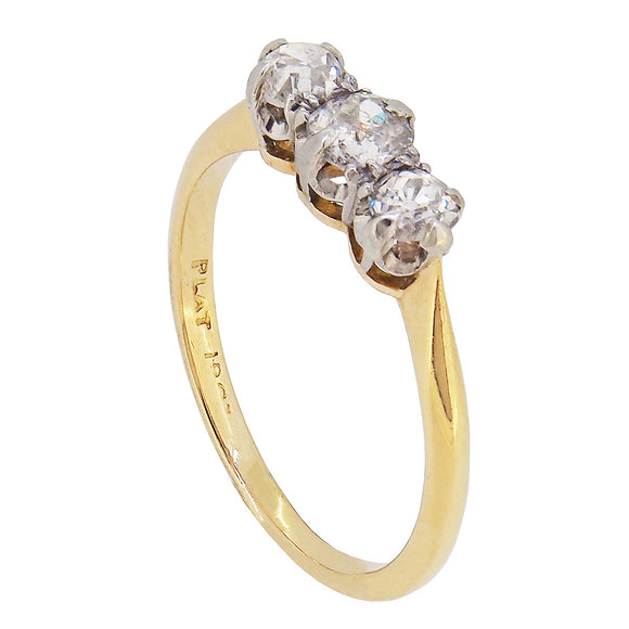 An early 20th century, 18ct yellow gold & platinum setting, diamond set three stone ring