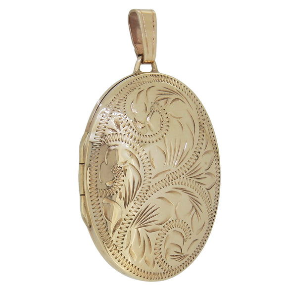 A modern, 9ct yellow gold, engraved oval locket