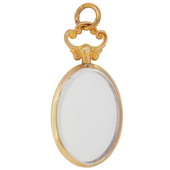 An Edwardian, 9ct yellow gold, 'picture frame', open, oval locket