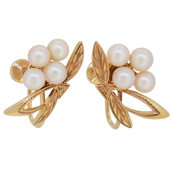 A pair of mid-20th century, 14ct yellow gold, pearl set, screw on earrings