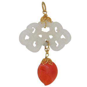 A modern, yellow gold, jade & pink carnelian set pendant