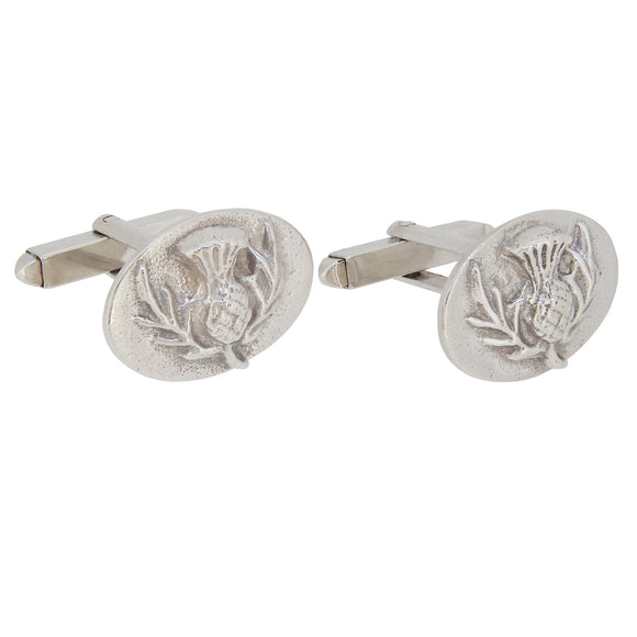 A pair of modern, silver, oval cufflinks with an image of a thistle on both