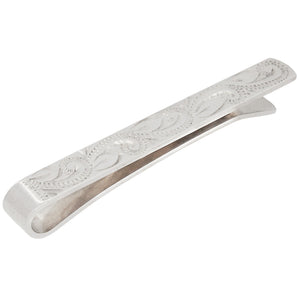 A modern, silver, engraved tie slide