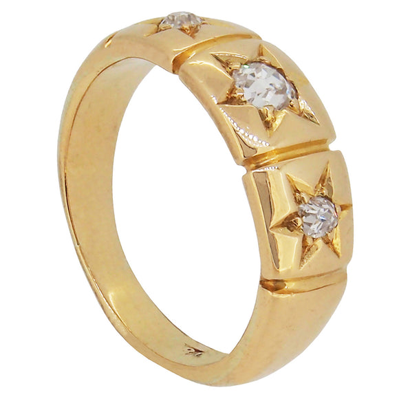 An early 20th century, 18ct yellow gold, diamond set, three stone band ring