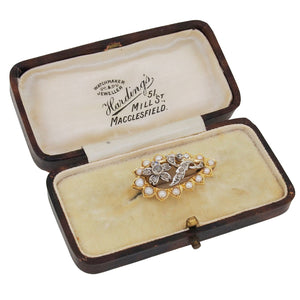 A Victorian, yellow gold, half pearl & rose diamond set brooch & fitted case