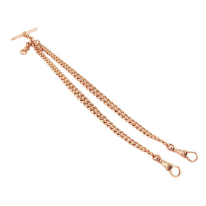 An early 20th century, 9ct rose gold, double Albert chain.