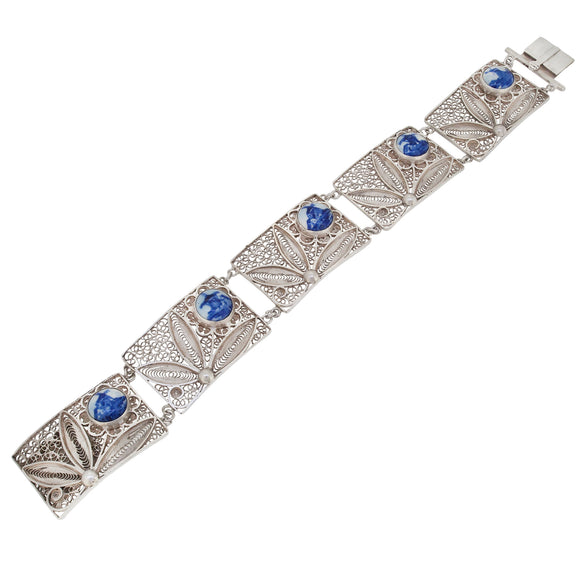 An early 20th century, silver, Delft set, filigree panel bracelet
