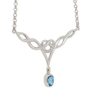 A modern, silver, blue topaz set, Celtic style necklet