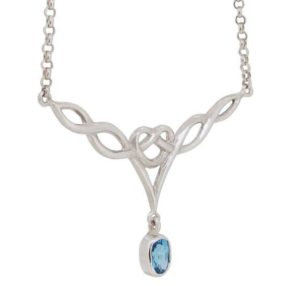 A modern, silver, blue topaz set, Celtic style necklet