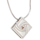 A modern, silver, mother of pearl set, abstract pendant