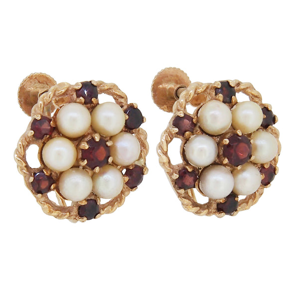 A pair of mid-20th century, garnet & pearl set screw on earrings
