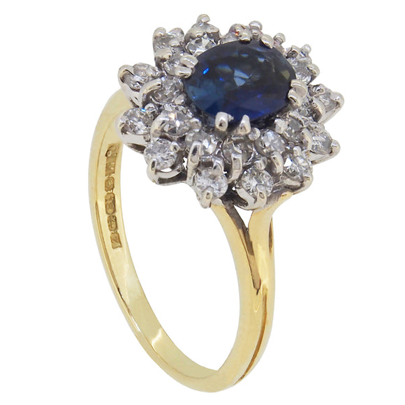 A modern, 18ct yellow gold, sapphire & diamond set concentric cluster ring