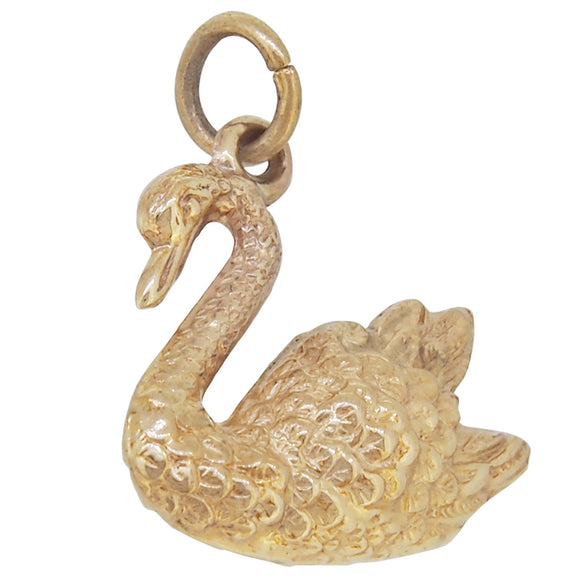 A modern, 9ct yellow gold swan charm