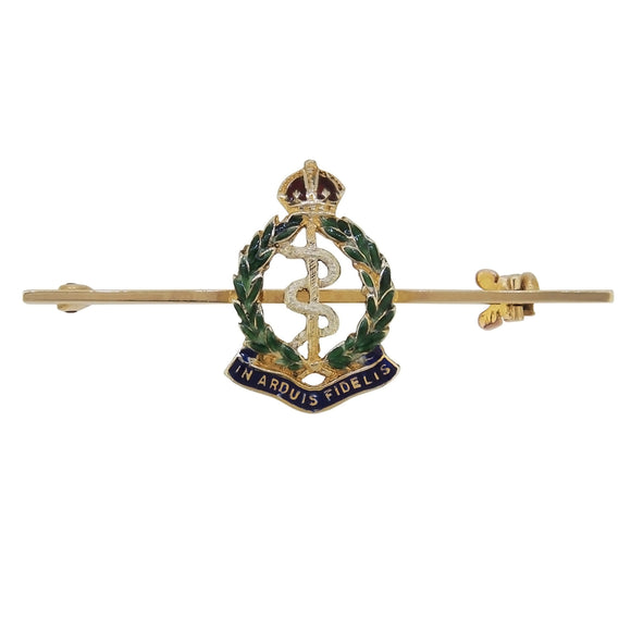 A mid-20th century, 9ct yellow gold, enamel set, Royal Army Medical Corps bar brooch