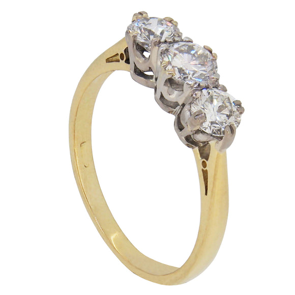 A modern, 18ct yellow gold & platinum setting, diamond set three stone ring