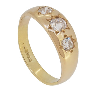 A modern, 18ct yellow gold, old cut diamond set, three stone Gypsy ring